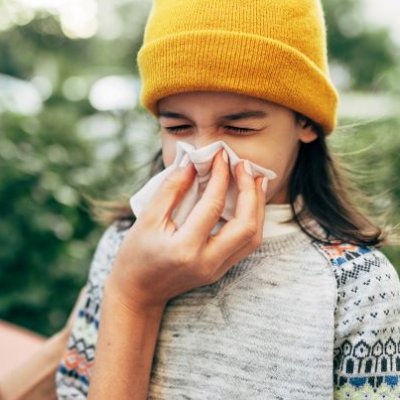 A child blowing nose